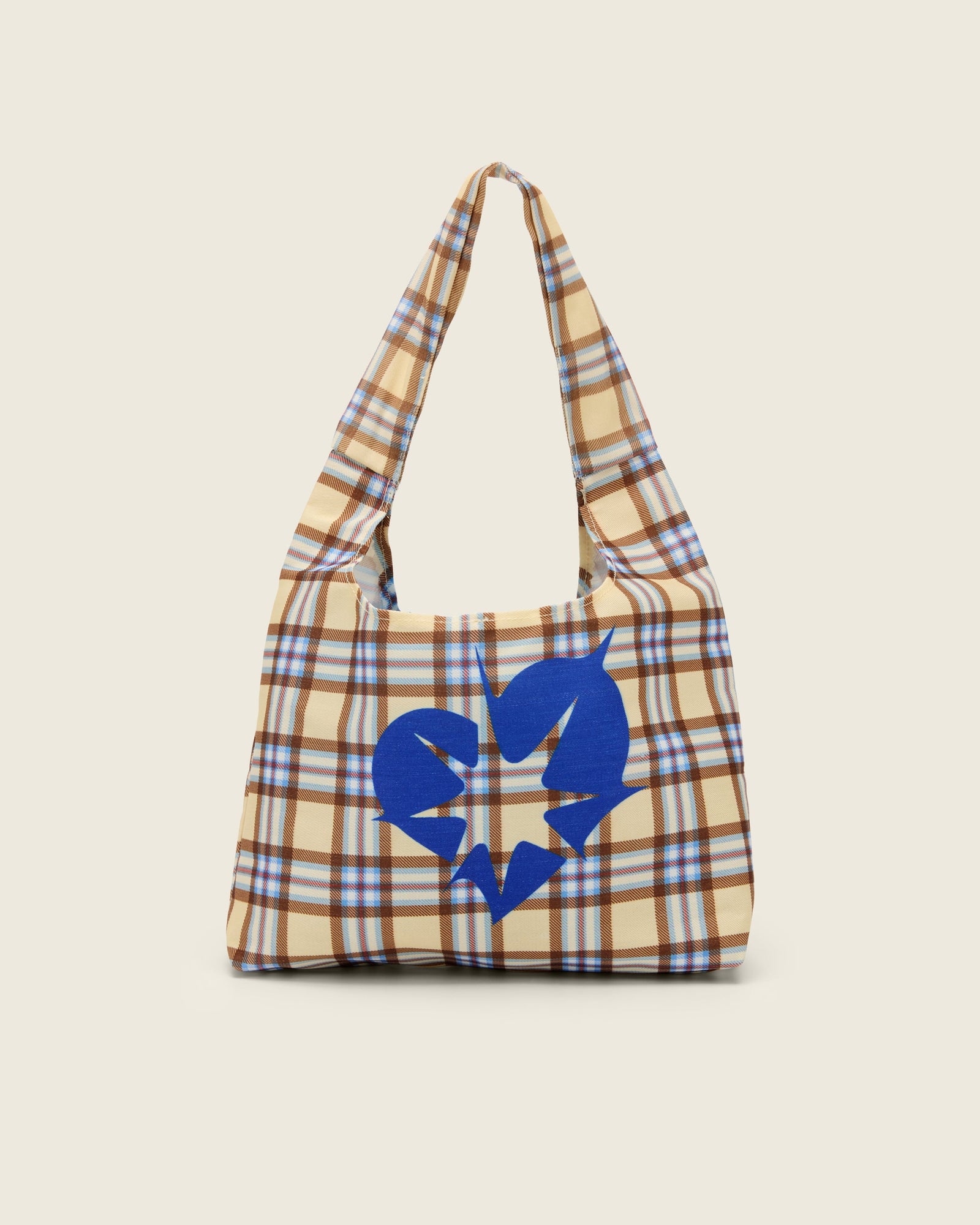 Bonnie Clyde® plaid tote bag with blue heart design on a beige background